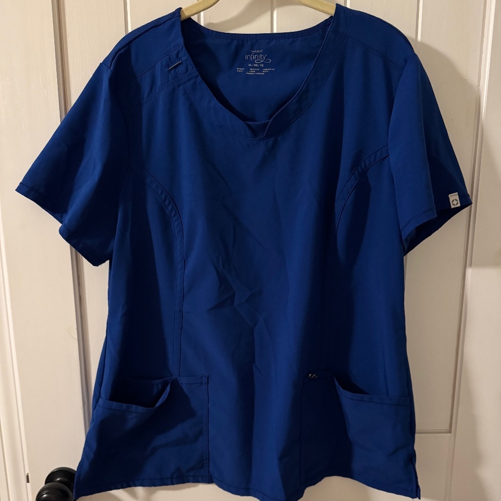 Infinity Cherokee Round Neck Nurse Scrub Top, Size XL, Color is Galaxy Blue.